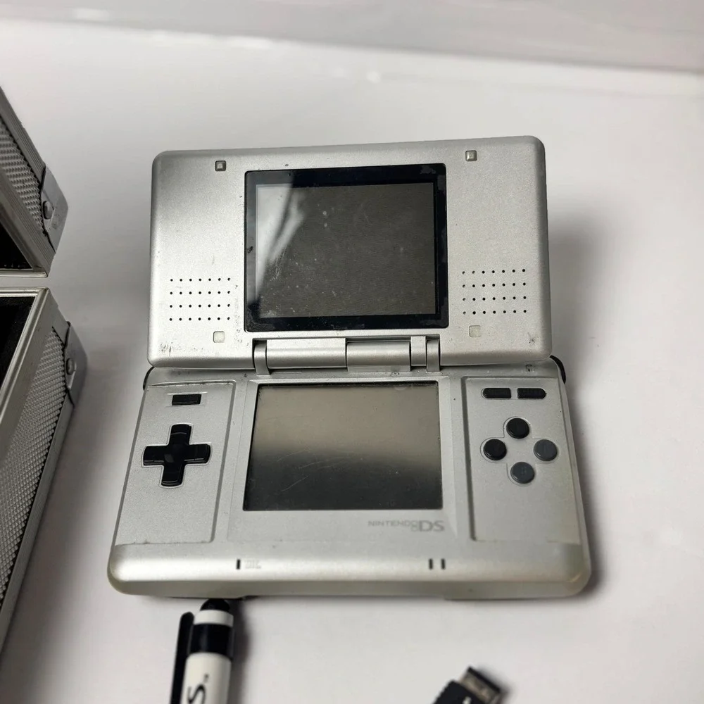Nintendo DS Silver Handheld Console with Intec Aluminum Case Accessories & games